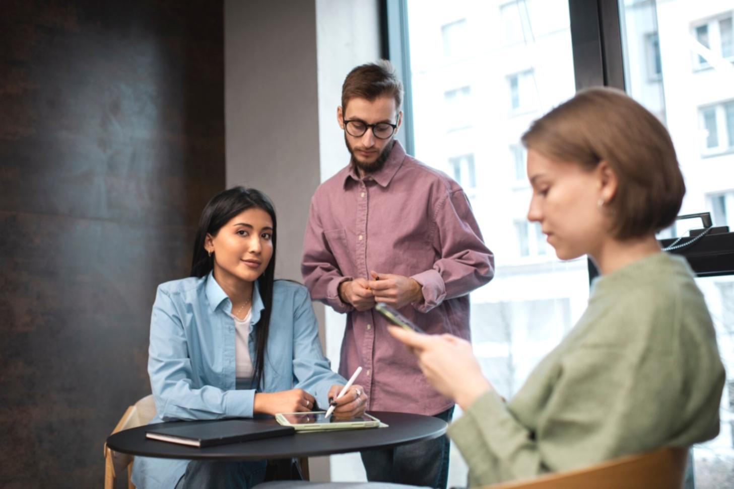 Financial team meeting discussing client communication strategies